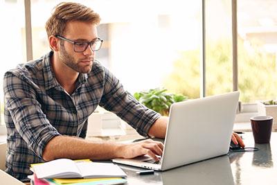 Student studying on laptop